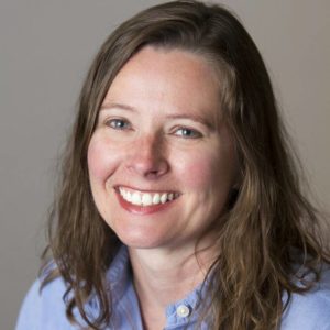 Rochelle Bradley is a white woman with longer brown hair.